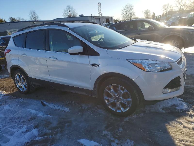 Photo 4 from auction – 2016 FORD ESCAPE with VIN 1FMCU0GXXGUA97341