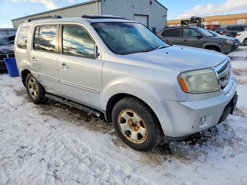 Photo 4 from auction – 2010 HONDA PILOT TOUR with VIN 5FNYF4H97AB502860