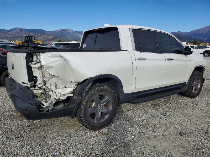 Photo 3 from auction – 2021 HONDA RIDGELINE with VIN 5FPYK3F79MB006574