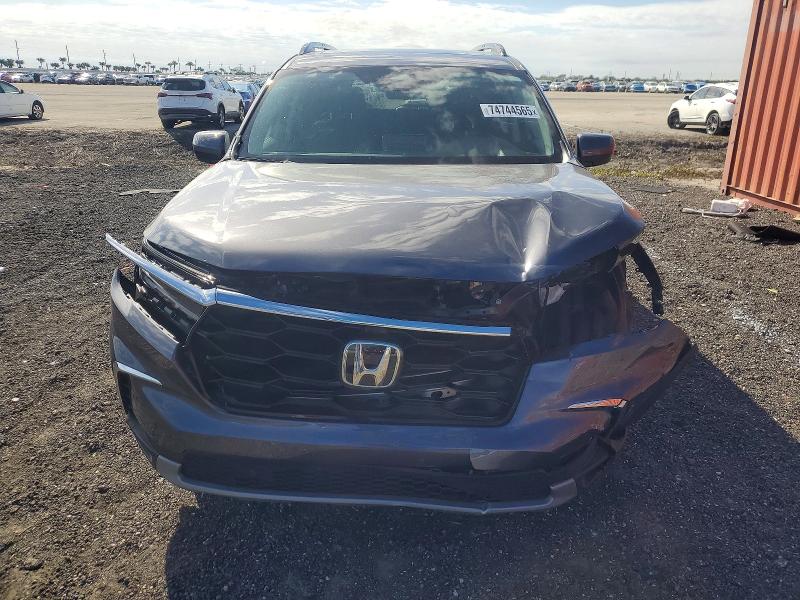 Photo 5 from auction – 2023 HONDA PILOT ELIT with VIN 5FNYG1H88PB048517