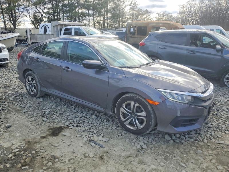 Photo 4 from auction – 2017 HONDA CIVIC LX with VIN 2HGFC2F59HH558552