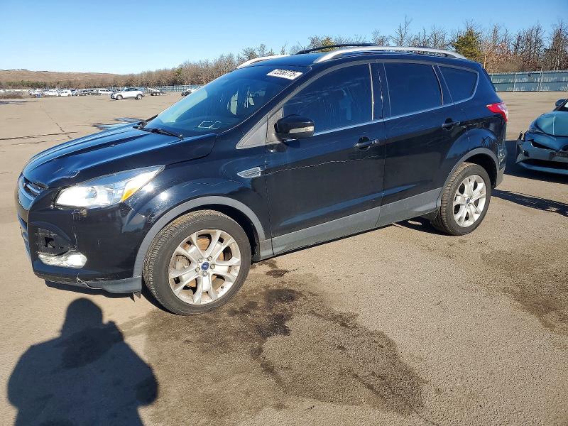 FORD ESCAPE TIT 2016 with VIN 1FMCU9JX9GUB50804 - Photo from auction