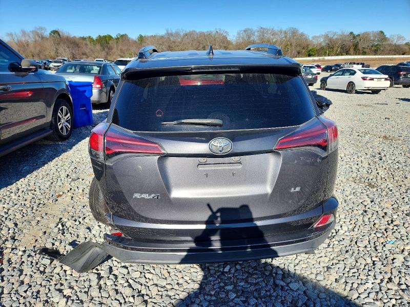 Photo 6 from auction – 2018 TOYOTA RAV4 LE with VIN 2T3ZFREV9JW457210