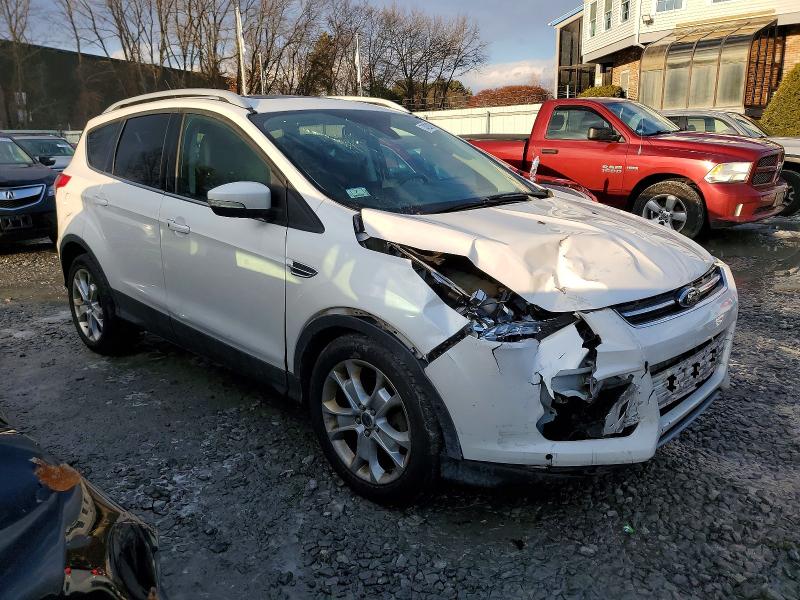Photo 4 from auction – 2014 FORD ESCAPE TIT with VIN 1FMCU9J93EUD12764