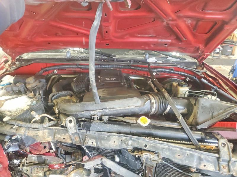 Photo 11 from auction – 2006 NISSAN FRONTIER K with VIN 1N6AD06W56C406865