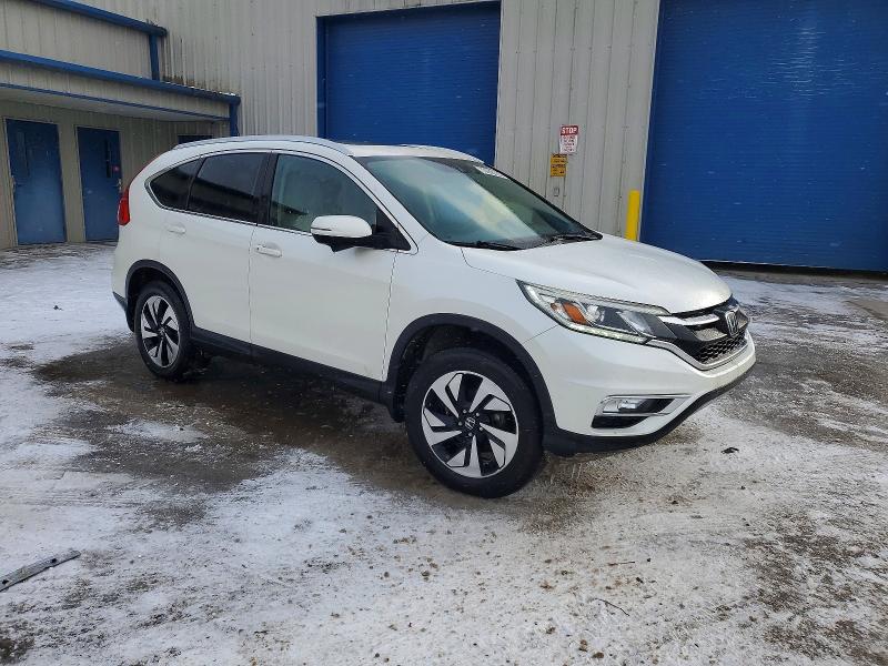 Photo 4 from auction – 2015 HONDA CR-V TOURI with VIN 5J6RM4H93FL047630