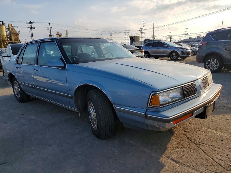 Снимка 4 от търг – 1989 OLDSMOBILE DELTA 88 с VIN 1G3HY54CXKW332427