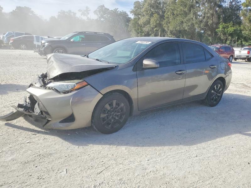 TOYOTA COROLLA 2019 with VIN 5YFBURHE0KP888405 - Photo from auction