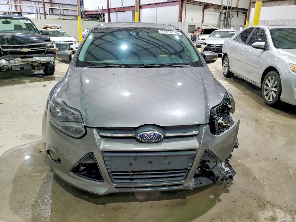 Photo 5 from auction – 2014 FORD FOCUS TITA with VIN 1FADP3J21EL137068