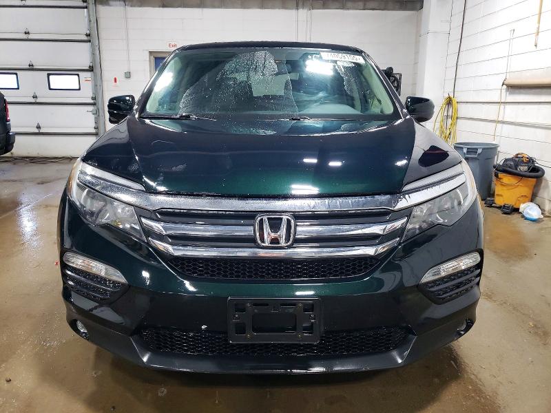 Photo 5 from auction – 2016 HONDA PILOT EXL with VIN 5FNYF6H59GB029254