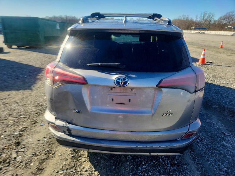 Photo 6 from auction – 2017 TOYOTA RAV4 HV LE with VIN JTMRJREV6HD079711
