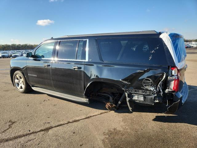 Photo 2 from auction – 2017 CHEVROLET SUBURBAN with VIN 1GNSKHKC1HR199017