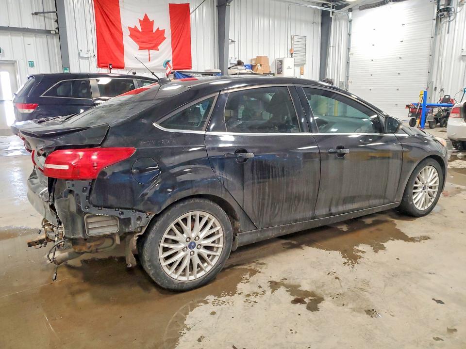Photo 3 from auction – 2016 FORD FOCUS with VIN 1FADP3J27GL317027