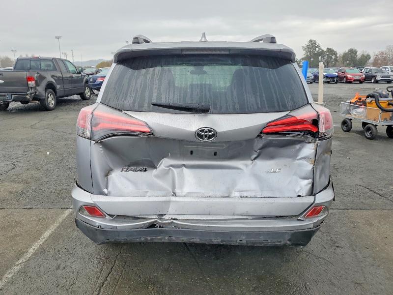 Photo 6 from auction – 2018 TOYOTA RAV4 with VIN JTMZFREV8JD130729