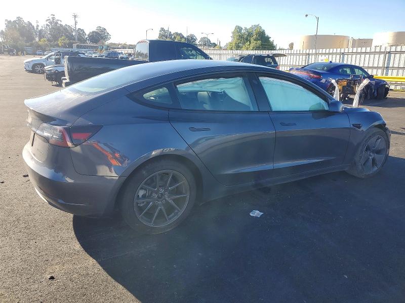 Photo 3 from auction – 2022 TESLA MODEL 3 with VIN 5YJ3E1EB1NF123815