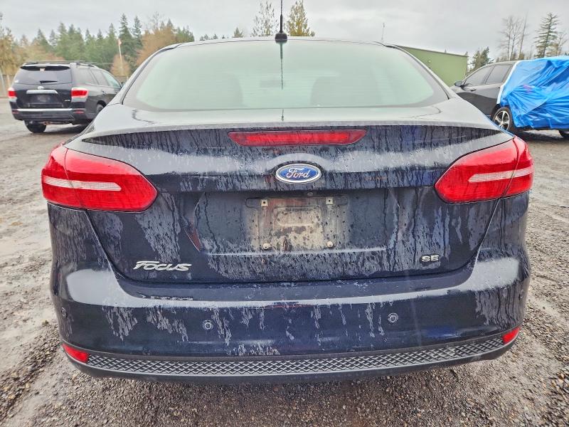 Photo 6 from auction – 2016 FORD FOCUS with VIN 1FADP3F24GL276302