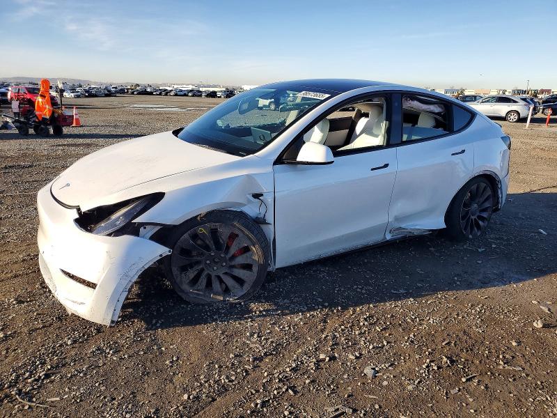 TESLA MODEL Y 2022 with VIN 7SAYGDEF0NF342031 - Photo from auction
