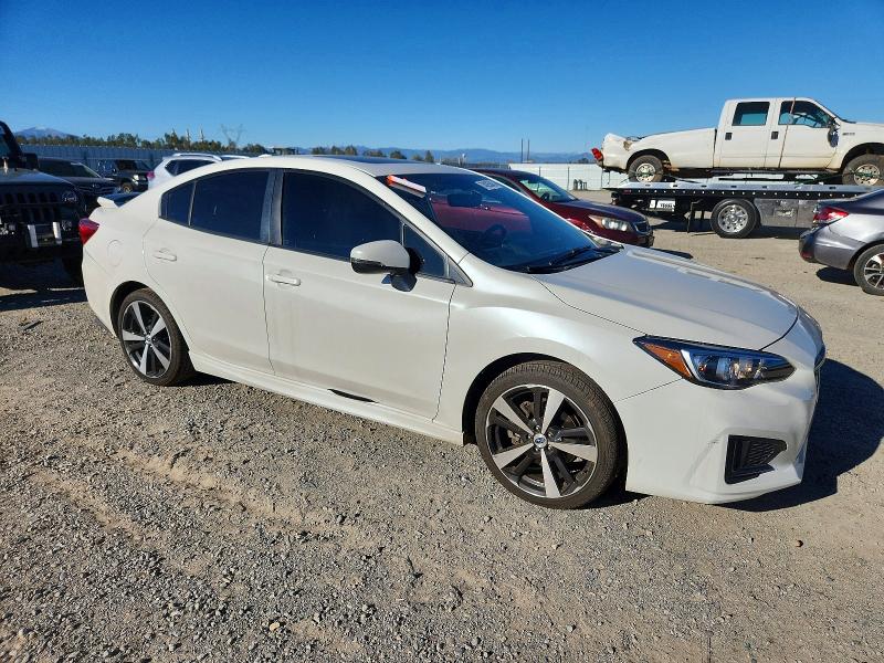 Photo 4 from auction – 2017 SUBARU IMPREZA SP with VIN 4S3GKAM68H3615712