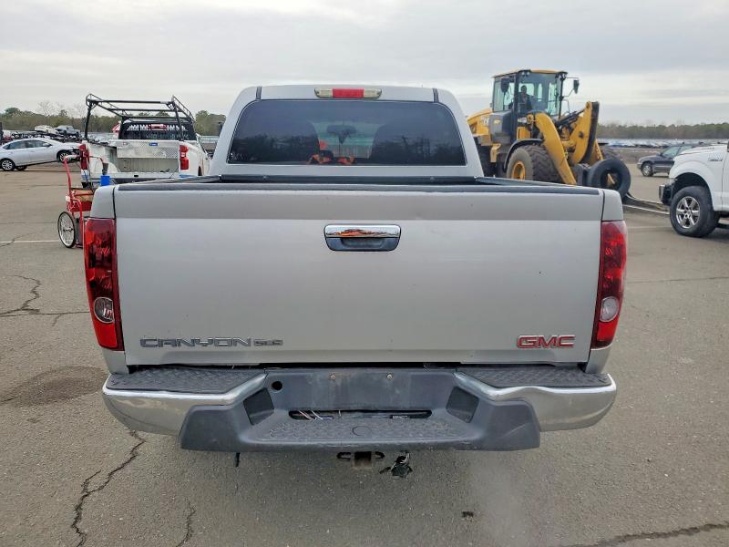 Photo 6 from auction – 2011 GMC CANYON with VIN 1GTH6MFEXB8106083