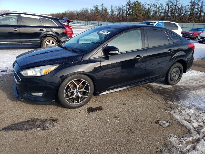 FORD FOCUS 2016 with VIN 1FADP3F25GL237055 - Photo from auction