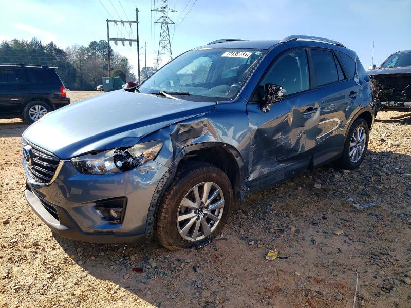 MAZDA CX-5 TOURI 2016 с VIN JM3KE2CY5G0806330 - Фото с аукциона