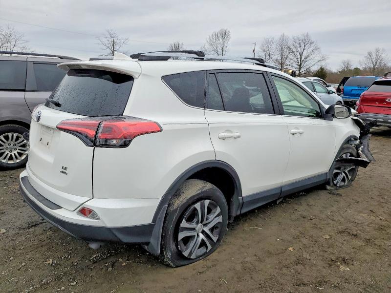 Photo 3 from auction – 2017 TOYOTA RAV4 LE with VIN JTMBFREV0HJ700784