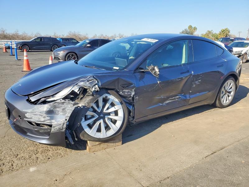 TESLA MODEL 3 2022 with VIN 5YJ3E1EA8NF296674 - Photo from auction