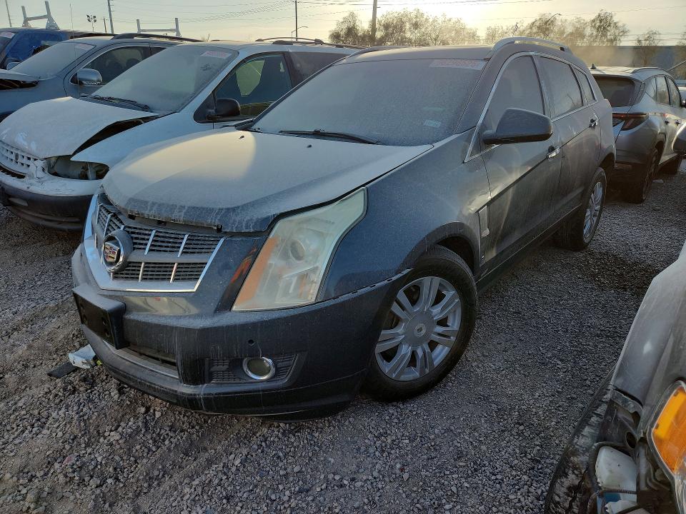 CADILLAC SRX LUXURY 2012 with VIN 3GYFNAE34CS660019 - Photo from auction
