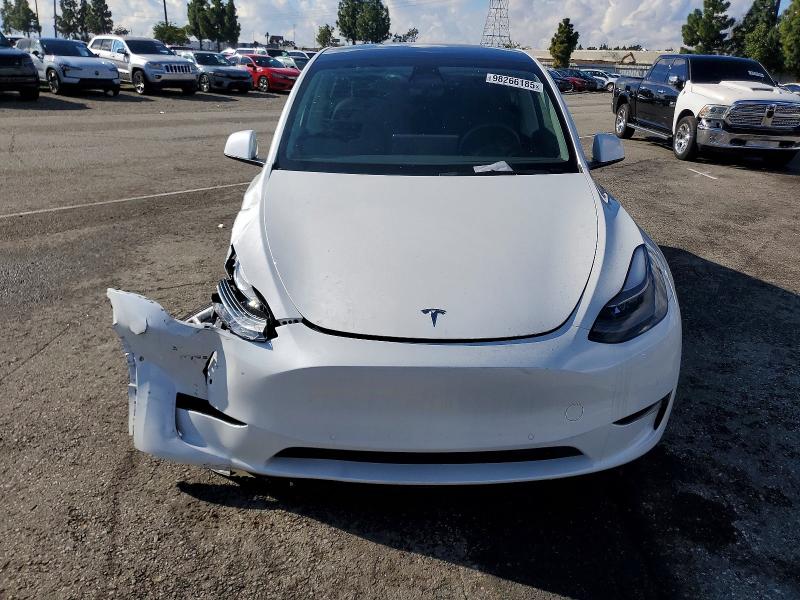 Photo 5 from auction – 2022 TESLA MODEL Y with VIN 7SAYGDEE9NF552618