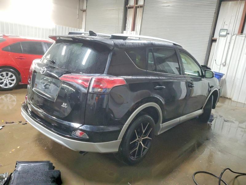 Photo 3 from auction – 2016 TOYOTA RAV4 SE with VIN JTMJFREV4GD176063