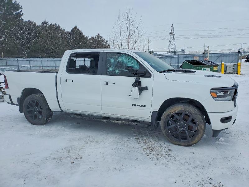 Photo 4 from auction – 2023 RAM 1500 with VIN 1C6SRFVTXPN690641
