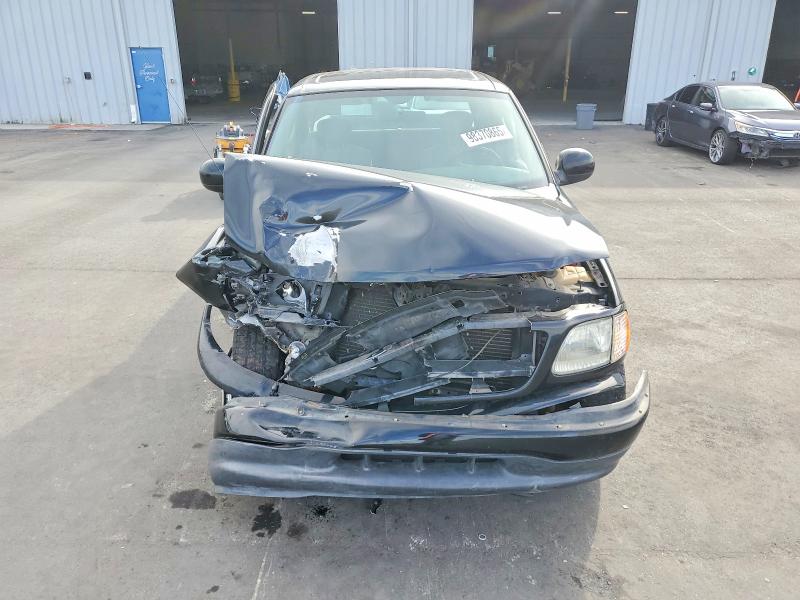 Photo 5 from auction – 2003 FORD F150 with VIN 1FTRX07WX3KD27561