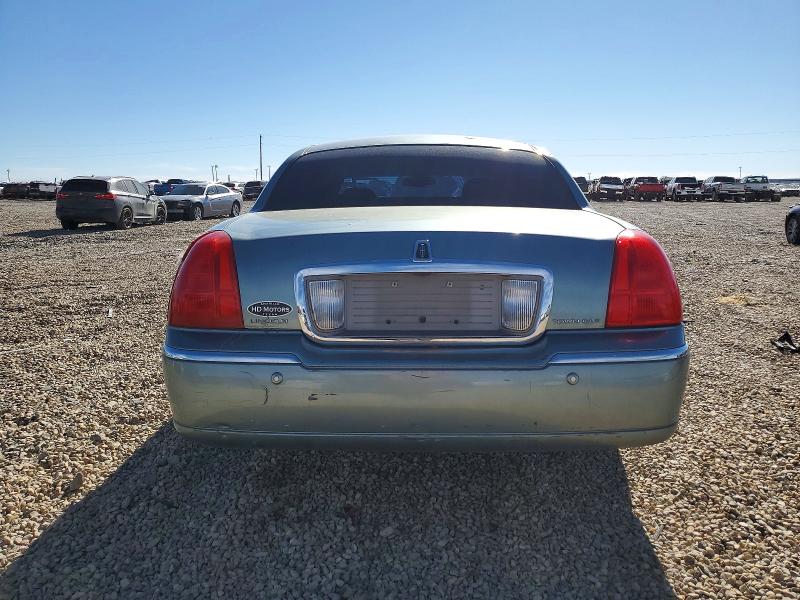 Photo 6 from auction – 2004 LINCOLN TOWN CAR E with VIN 1LNHM81W64Y684662