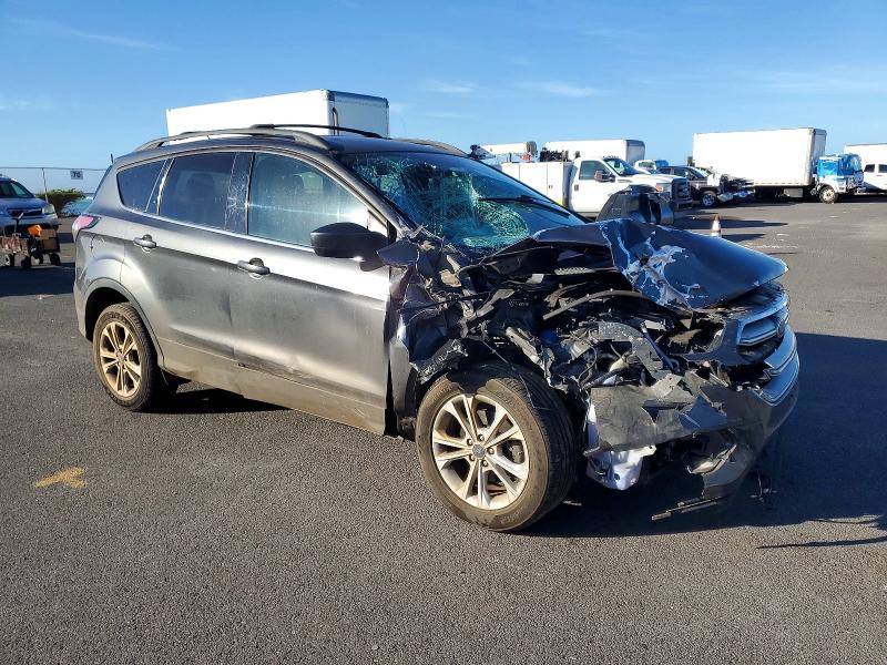 Photo 4 from auction – 2017 FORD ESCAPE with VIN 1FMCU0GDXHUC73330