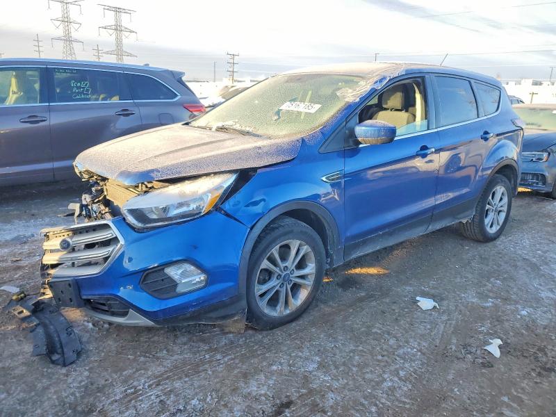 FORD ESCAPE 2017 with VIN 1FMCU9G95HUE66677 - Photo from auction