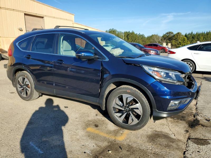 Photo 4 from auction – 2015 HONDA CR-V TOURI with VIN 5J6RM3H94FL022116