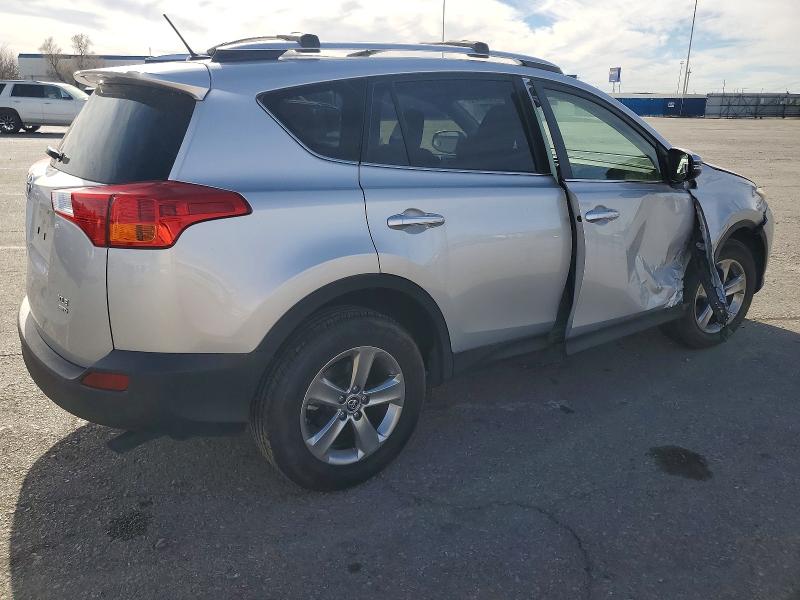 Photo 3 from auction – 2015 TOYOTA RAV4 XLE with VIN JTMRFREV8FD117325