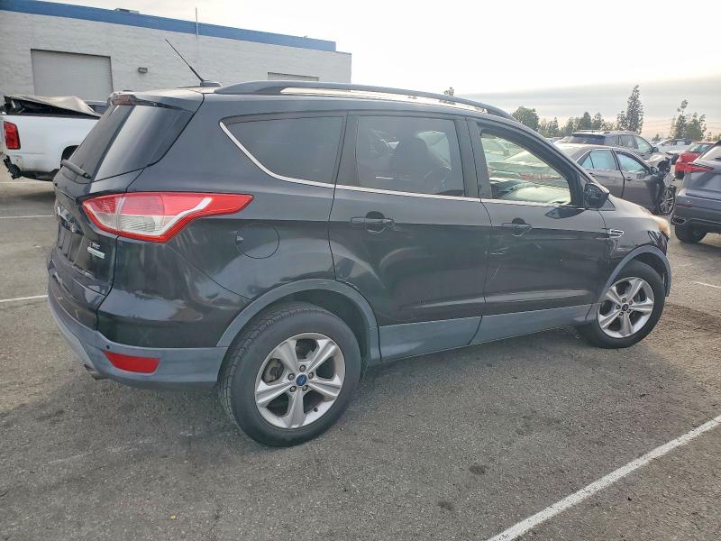 Photo 3 from auction – 2014 FORD ESCAPE SE with VIN 1FMCU0GX6EUA30085