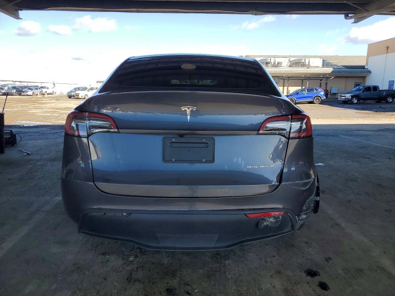 Photo 6 from auction – 2023 TESLA MODEL Y with VIN 7SAYGDEE8PF920449
