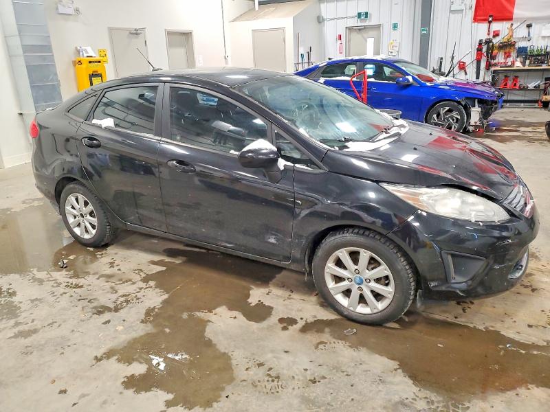 Photo 4 from auction – 2011 FORD FIESTA SE with VIN 3FADP4BJXBM168972