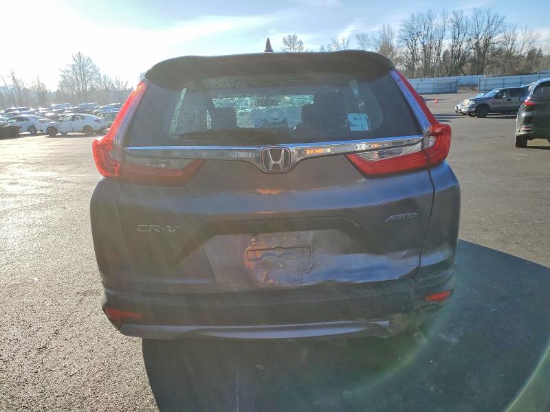 Photo 6 from auction – 2018 HONDA CR-V LX with VIN 2HKRW6H38JH207683
