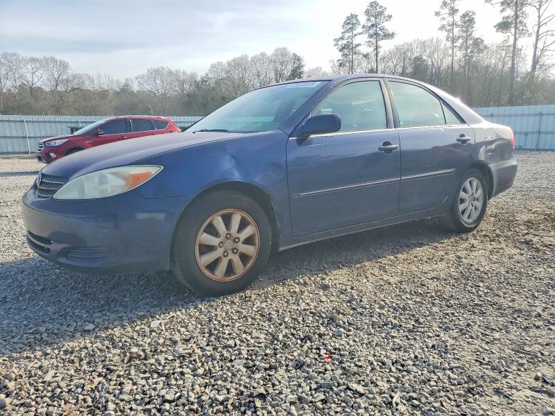 TOYOTA CAMRY LE 2002 with VIN 4T1BF30K02U540076 - Photo from auction