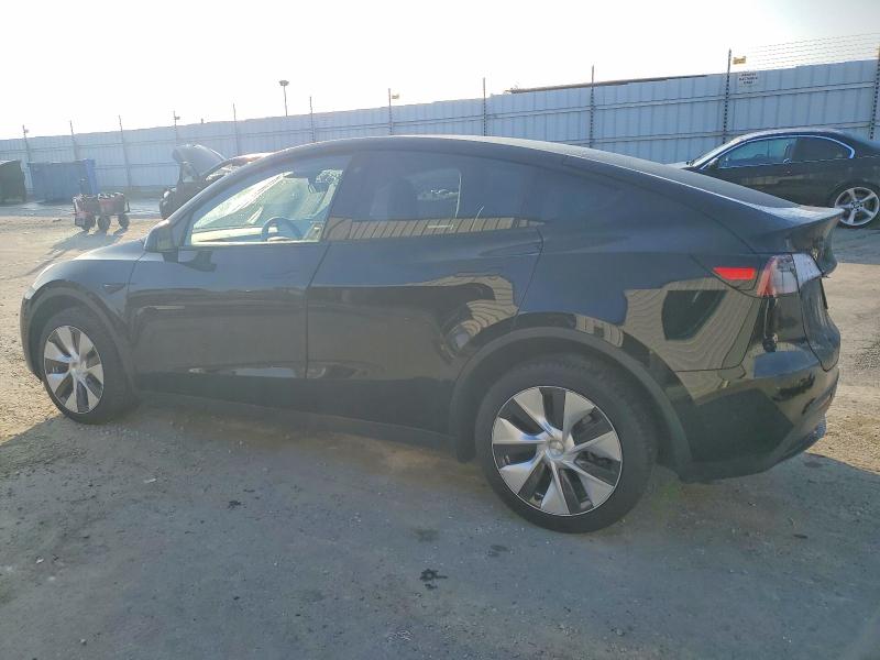 Photo 2 from auction – 2023 TESLA MODEL Y with VIN 7SAYGDEE2PF748354
