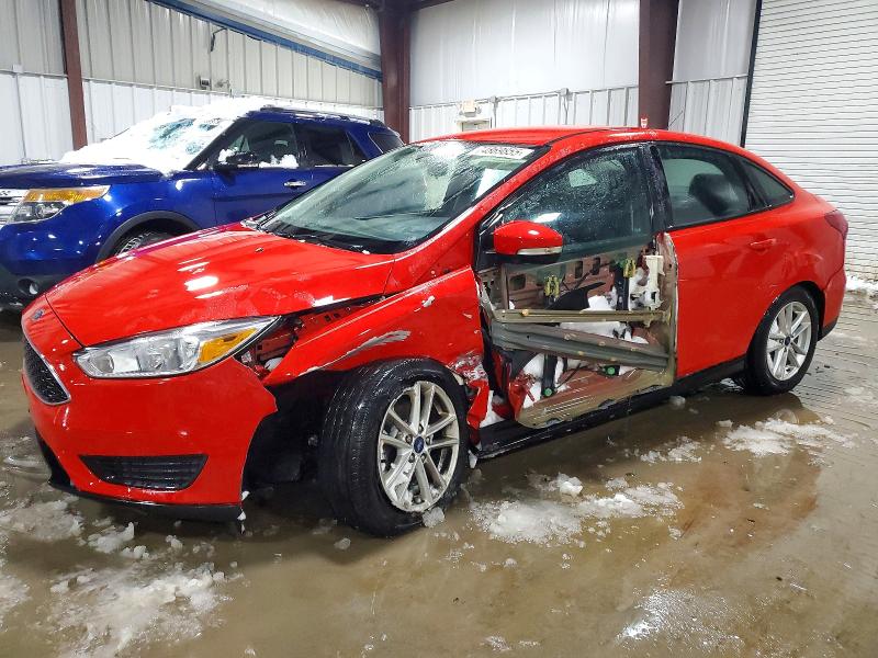 FORD FOCUS SE 2017 with VIN 1FADP3F29HL207882 - Photo from auction