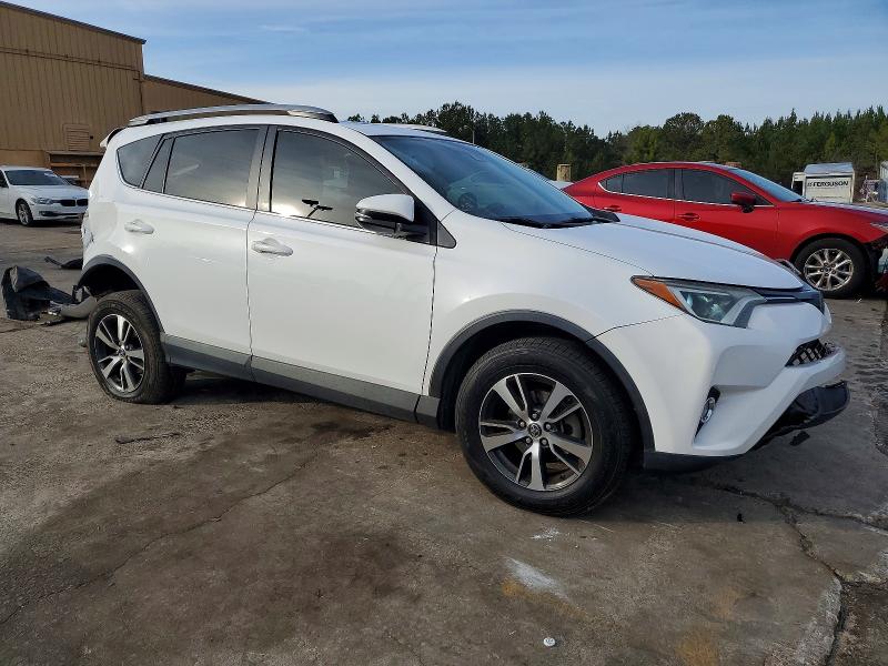 Photo 4 from auction – 2018 TOYOTA RAV4 with VIN 2T3WFREV6JW443218