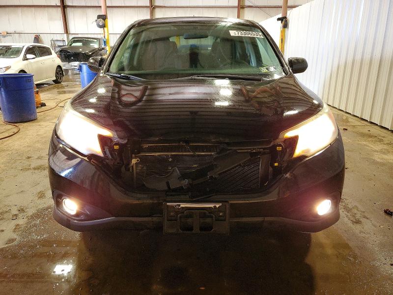 Photo 5 from auction – 2013 HONDA CR-V with VIN 2HKRM4H56DH625224