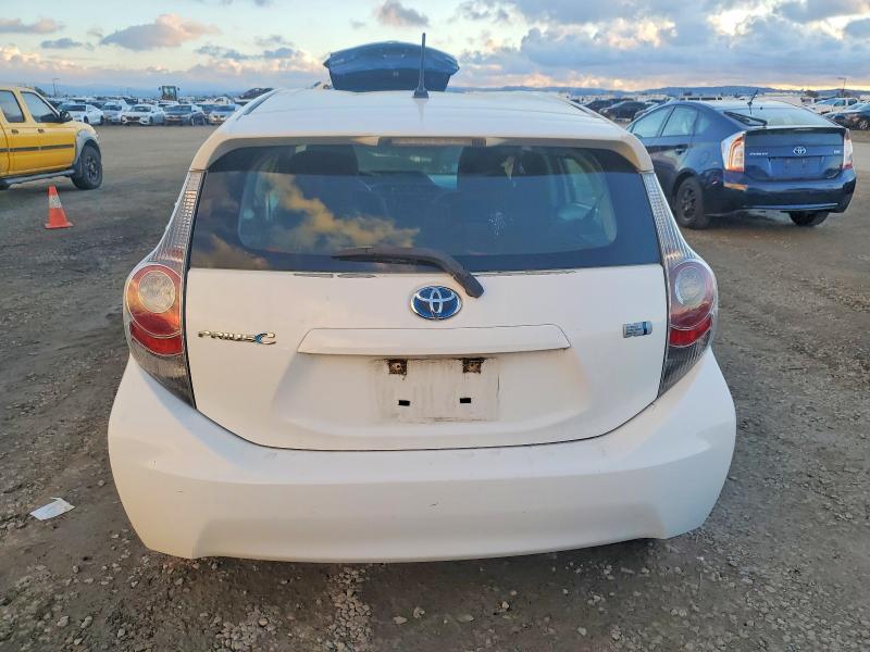 Photo 6 from auction – 2013 TOYOTA PRIUS C with VIN JTDKDTB30D1546836
