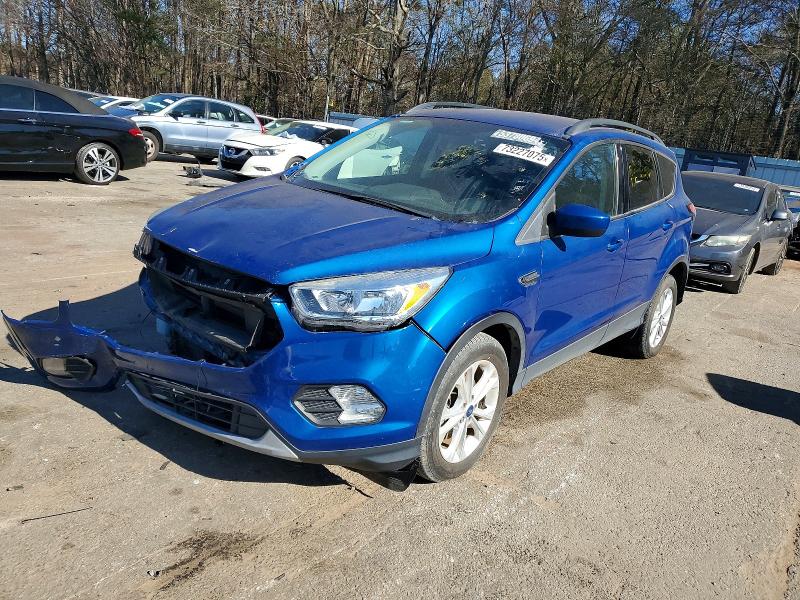 FORD ESCAPE 2018 with VIN 1FMCU9GD7JUD57275 - Photo from auction