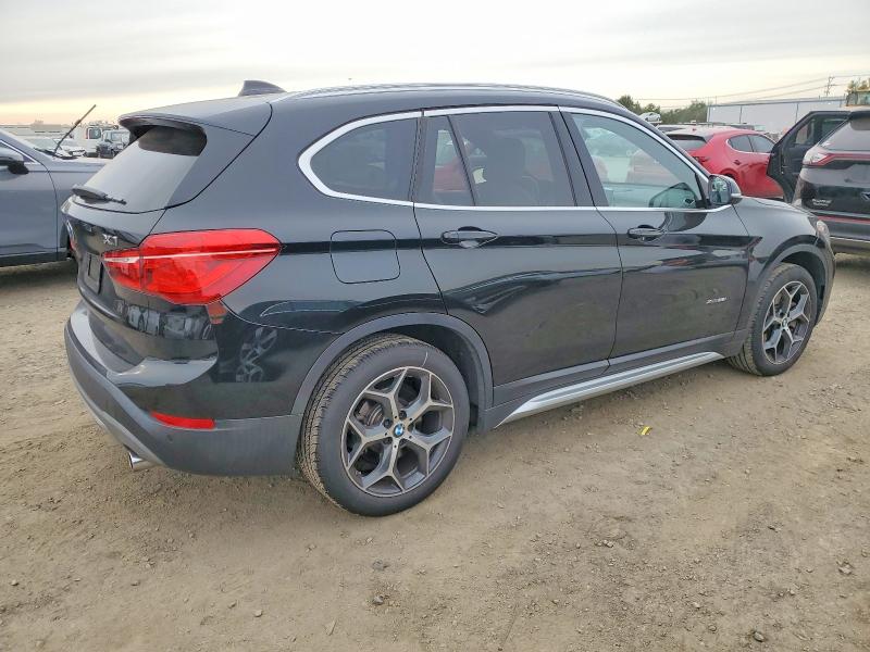 Photo 3 from auction – 2018 BMW X1 XDRIVE2 with VIN WBXHT3C38J5L24550
