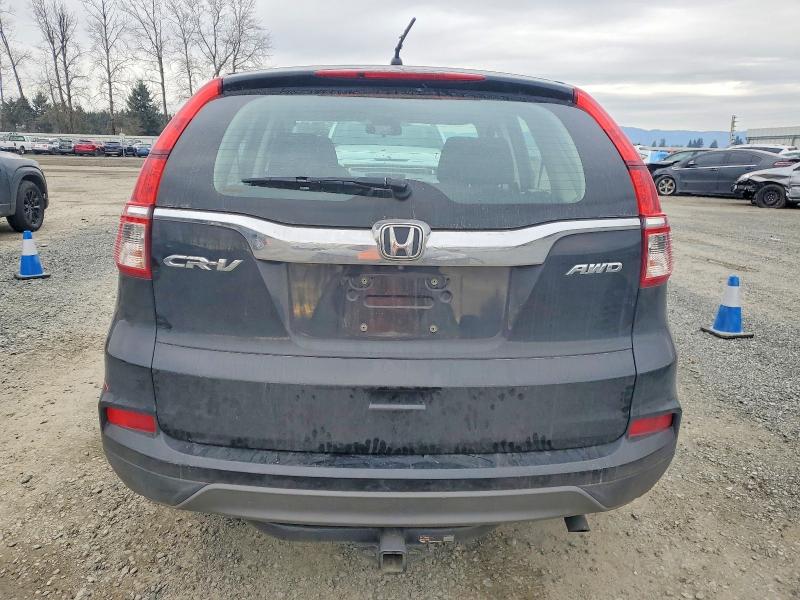 Photo 6 from auction – 2016 HONDA CR-V LX with VIN 2HKRM4H39GH703692